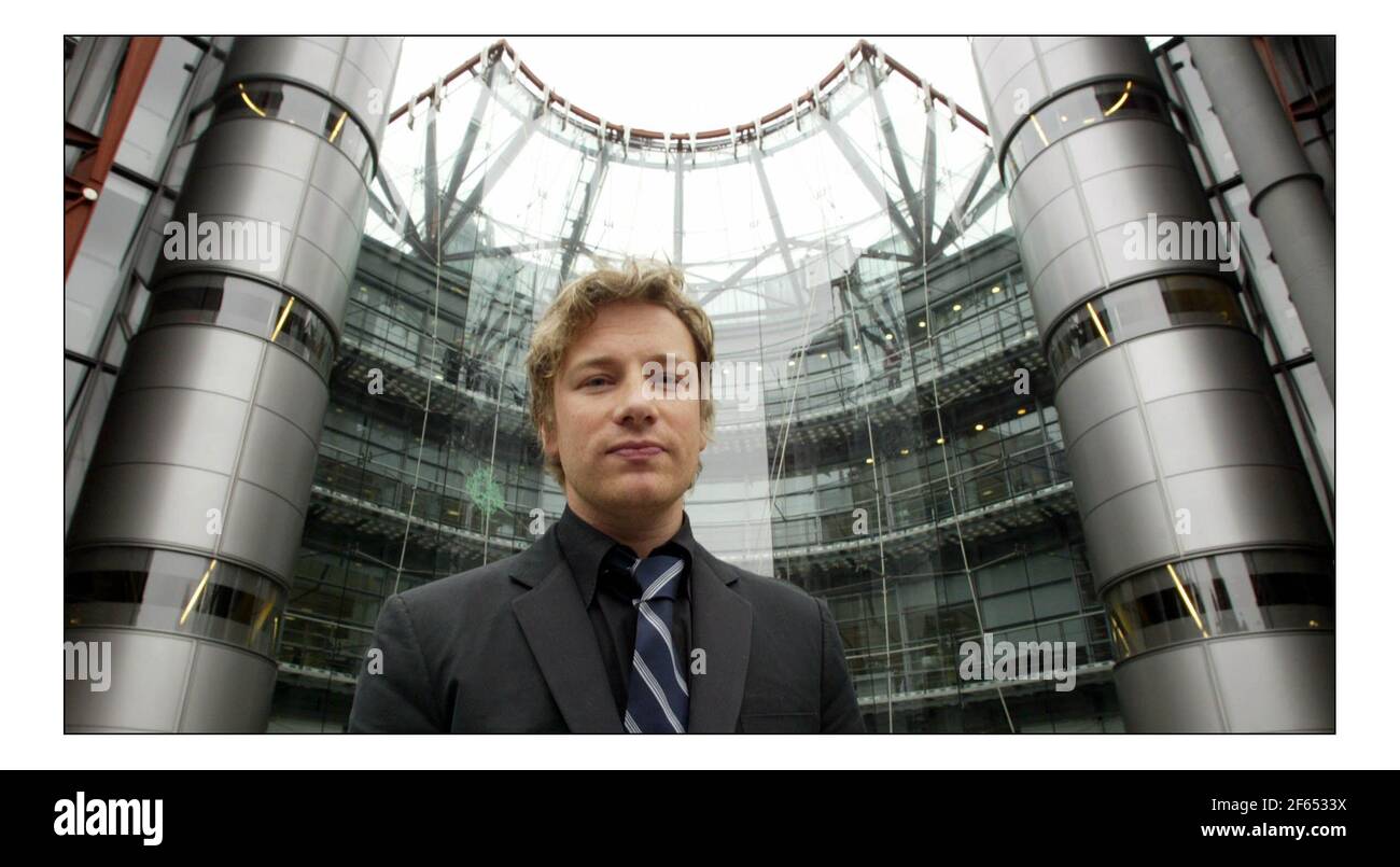 Jamie Oliver at a photocall before his press conf re school dinners held at Channel Four in Londonpic David Sandison 30/3/2005 Stock Photo