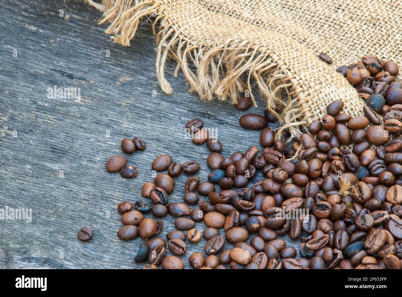 coffee beans on a rough sacking. Stock Photo