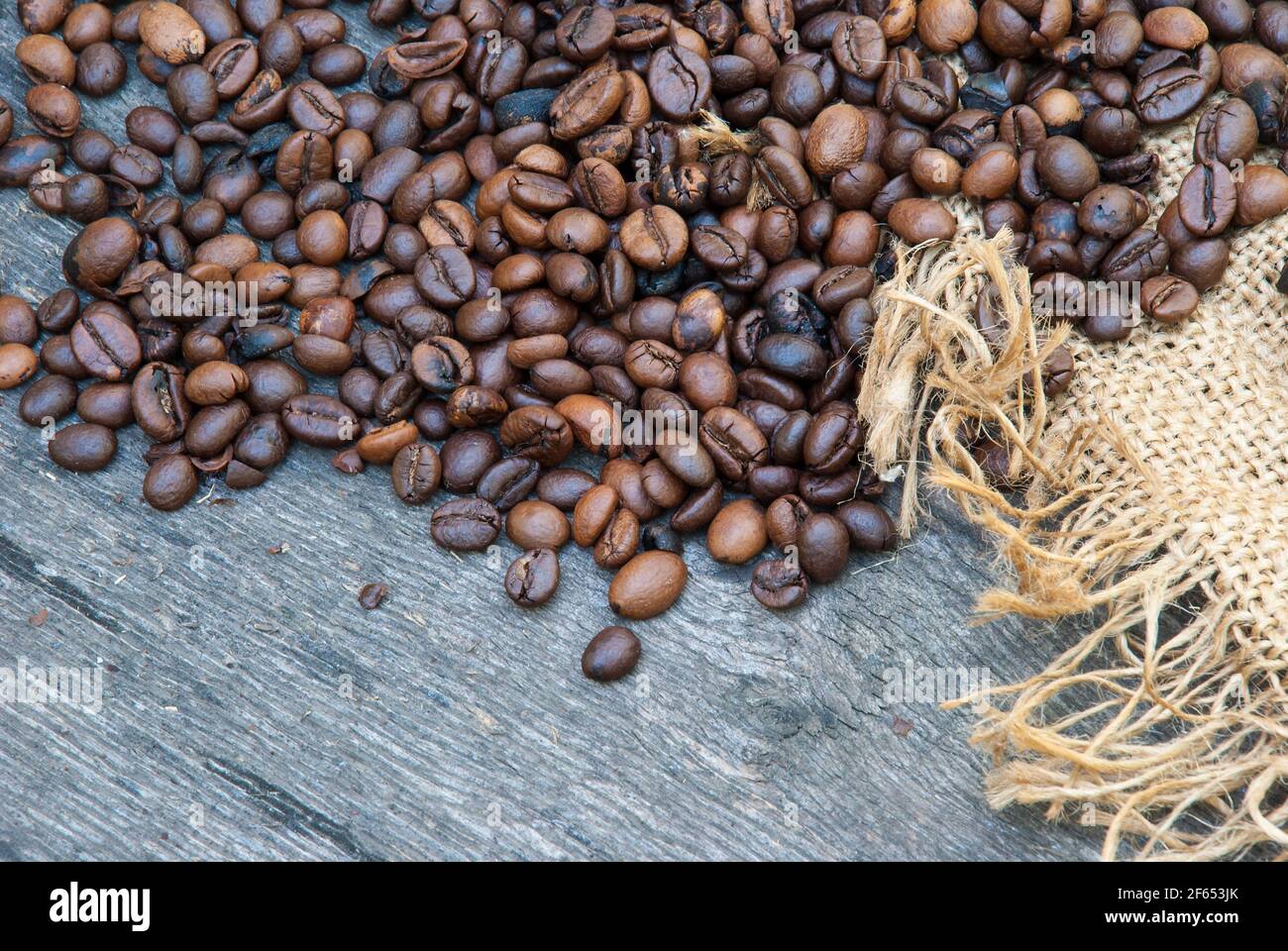 coffee beans on a rough sacking. Stock Photo