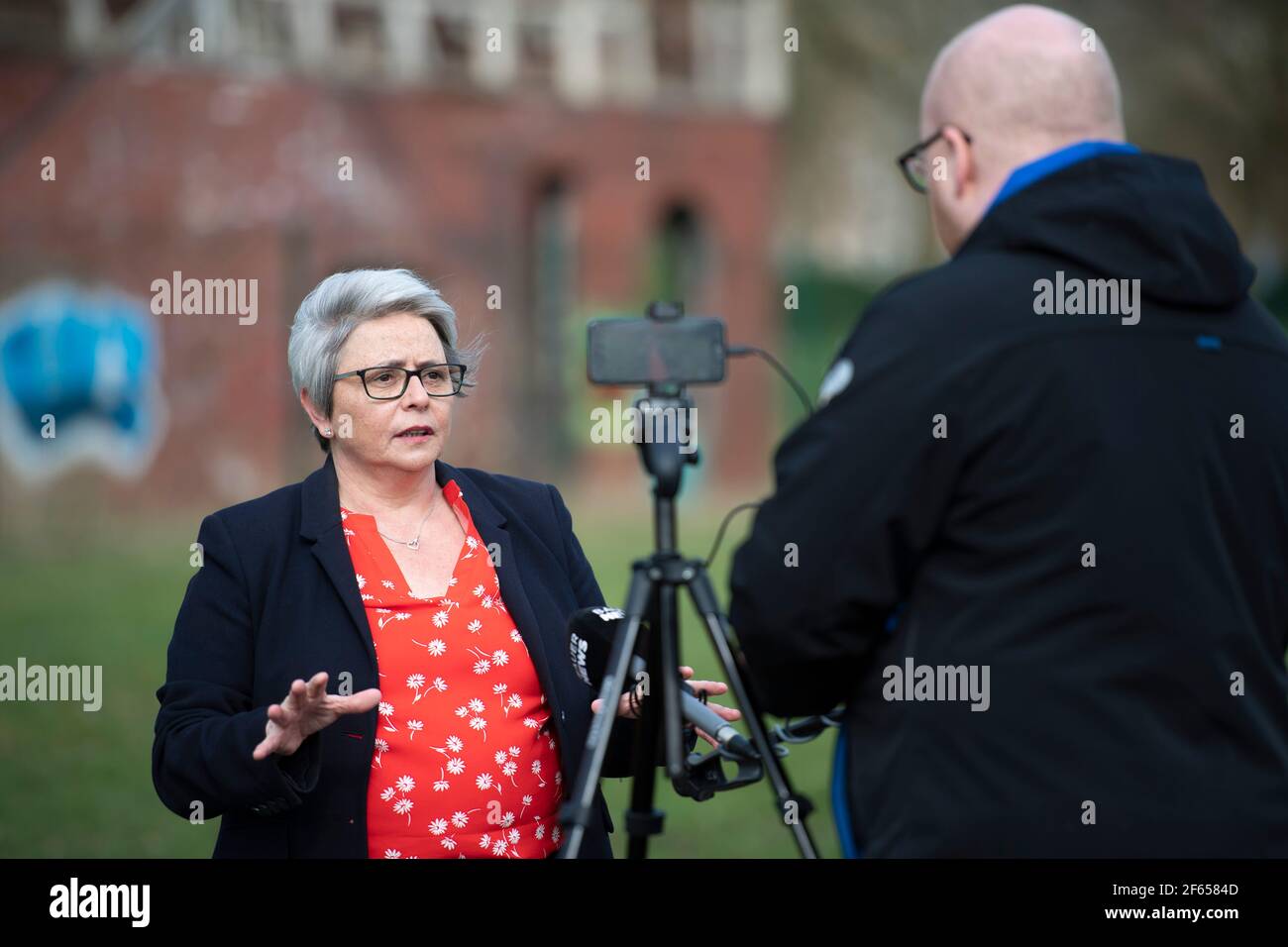 Glasgow, Scotland, UK. 30 March 2021. PICTURED: Annie Wells MSP shorts from the hill tops at Glasgow’s Springburn Winter Gardens with a loudspeaker on the party’s bid to repeal the Hate Crime Bill on the Holyrood Election campaign trail.  Credit: Colin Fisher/Alamy Live News Stock Photo