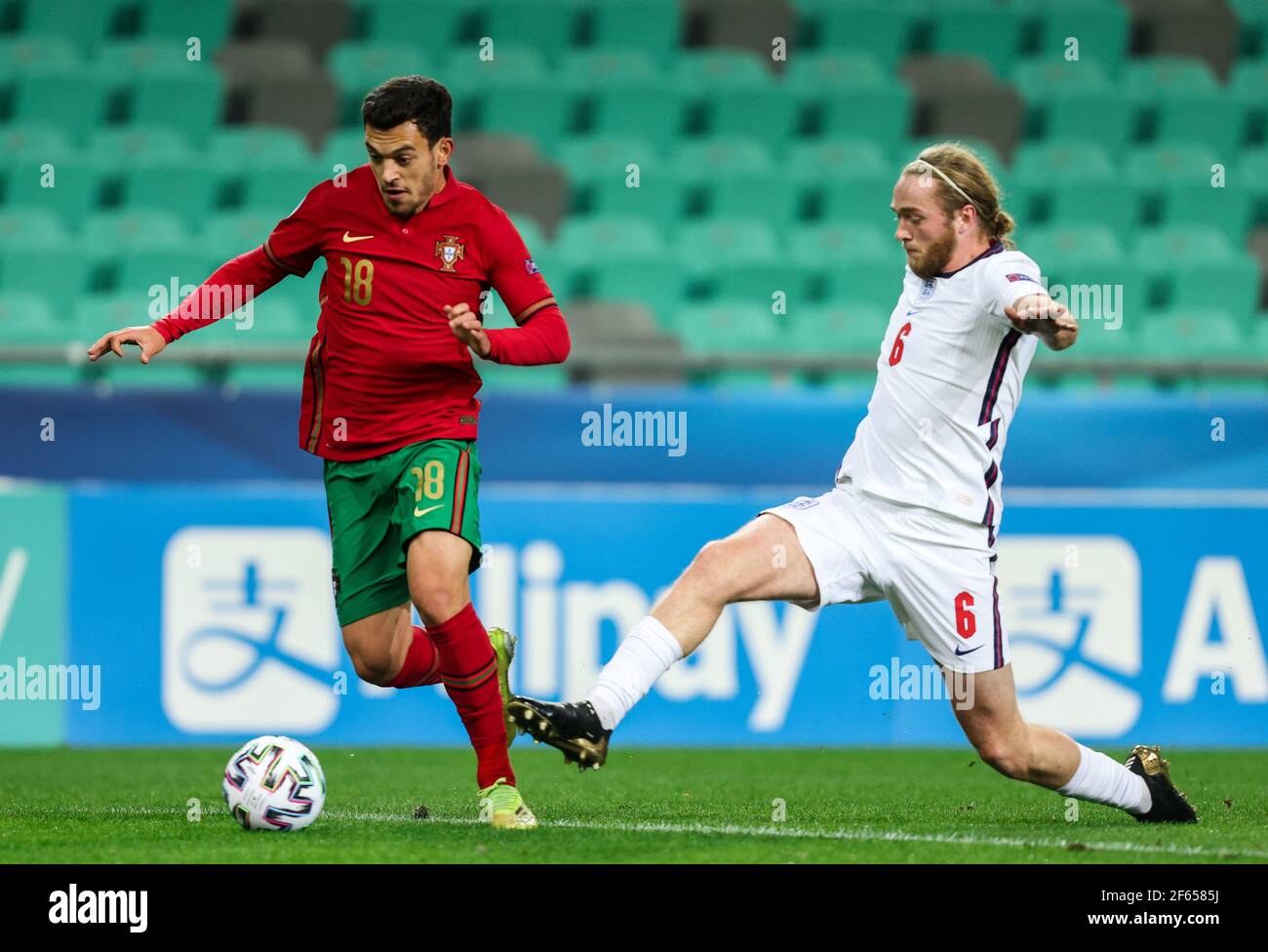 LJUBLJANA, SLOVENIA - MARCH 28: Pote of Portugal vs Tom Davies of England  during the 2021 UEFA European Under-21 Championship Group D match between  Portugal and England at Stadion Stozice on March