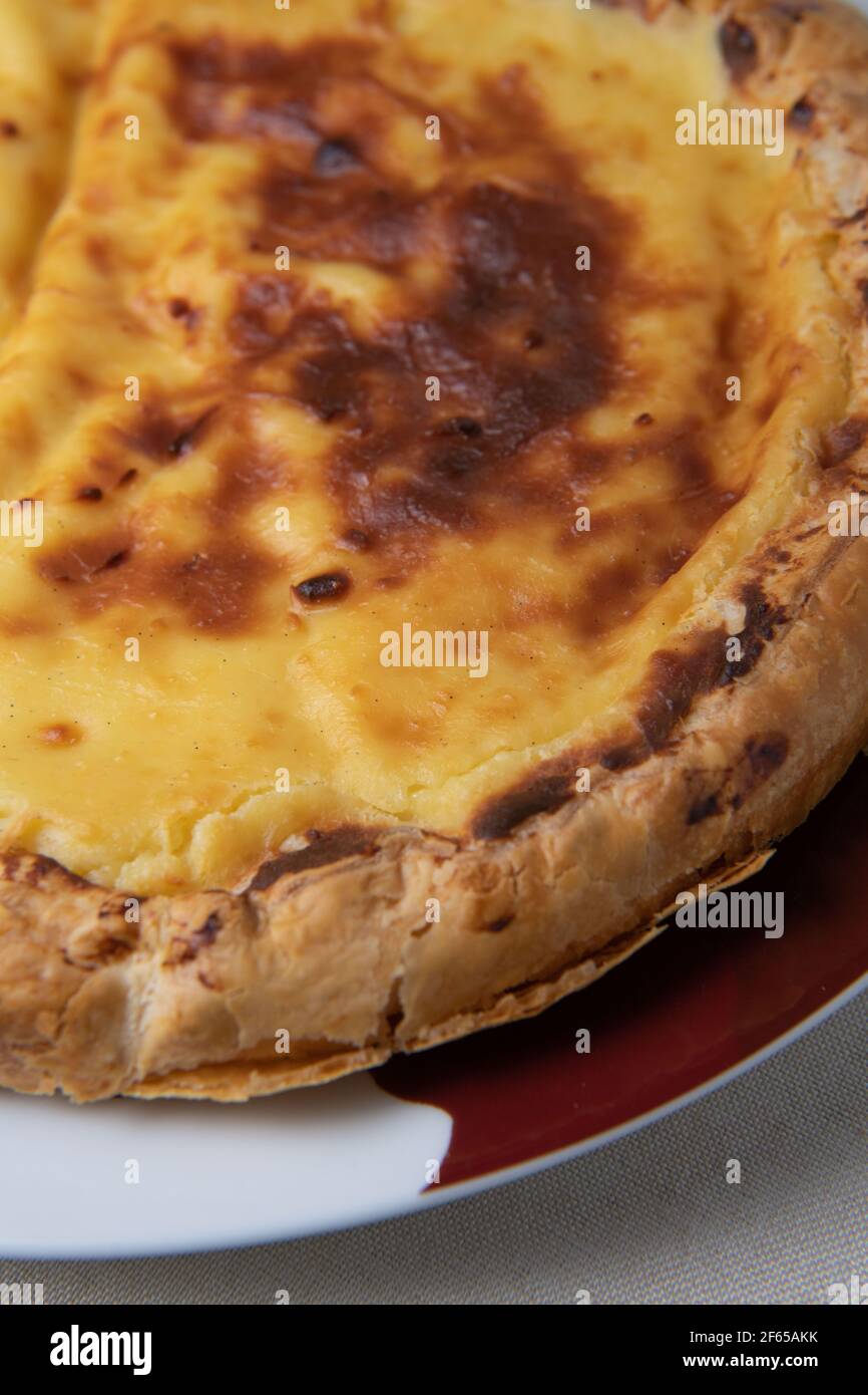 Parisian Flan, cutted classic tart served on a plate copy space Stock Photo