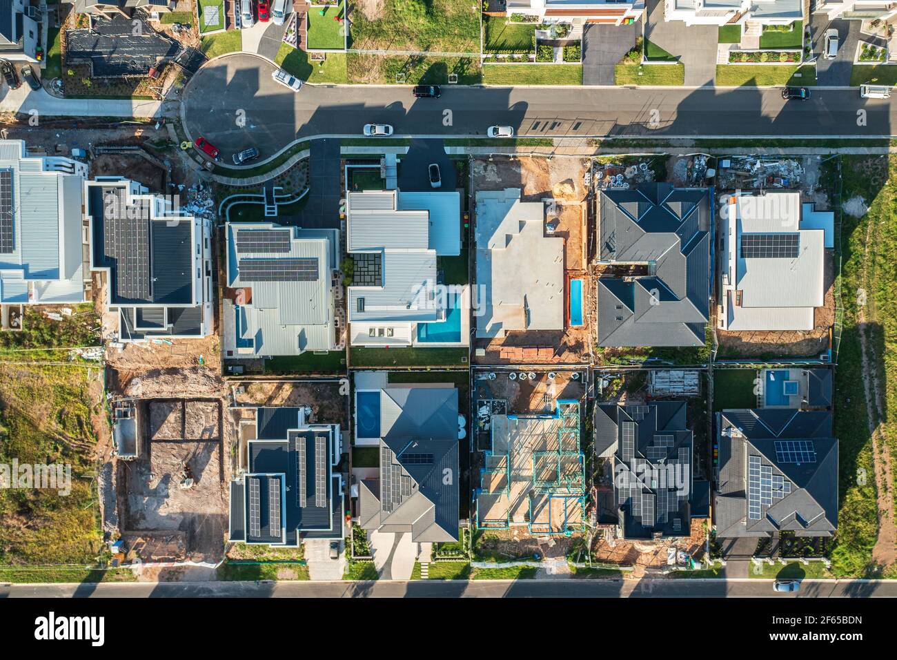 Topdown aerial view of modern upmarket houses in various stages of being constructed in Sydney, Australia. Stock Photo