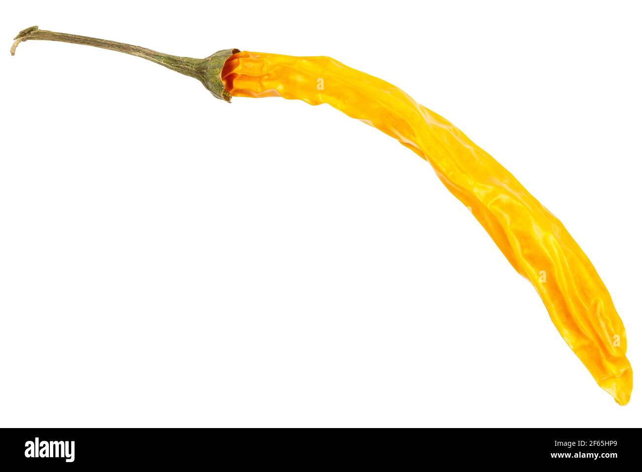 Yellow dried chili pepper isolated on white background Stock Photo - Alamy