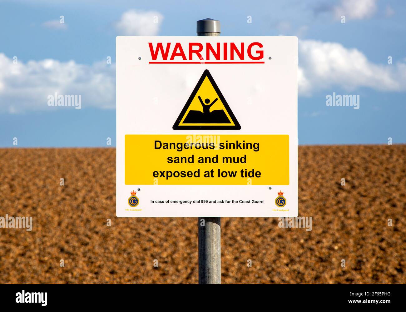 Sign warning of dangerous sinking sand and mud at low tide, Shingle
