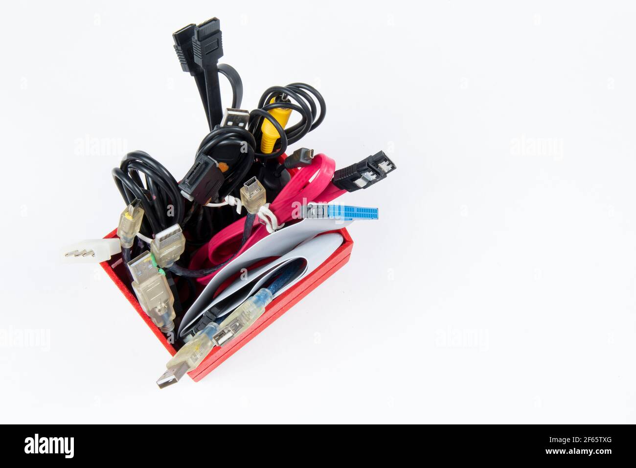 technological waste that remains in residence as computer cables Stock Photo