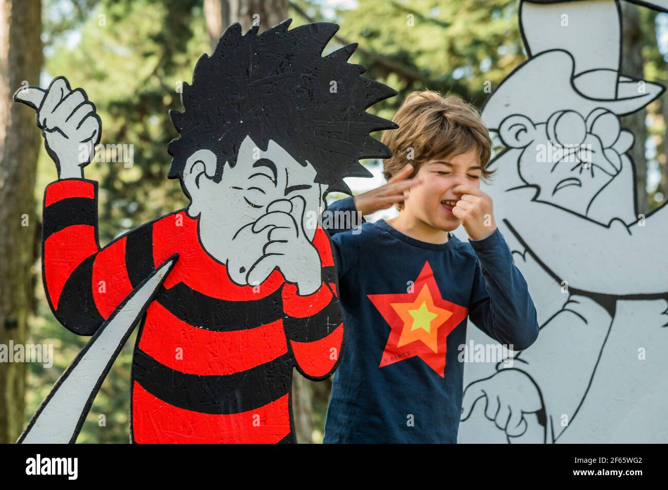 London, UK. 30th Mar, 2021. Stinky plants - Dennis and Gnasher's Big Bonanza, at Kew Gardens Easter festival, celebrating 70 years of Dennis the Menace in The Beano. The festival runs from Wednesday 31 March - Sunday 18 April and visitors will able to follow an exclusive, giant, 3D comic strip. The easing of the third 'lockdown' for the Coronavirus (Covid 19) has now moved to stage 1c in the UK. Credit: Guy Bell/Alamy Live News Stock Photo