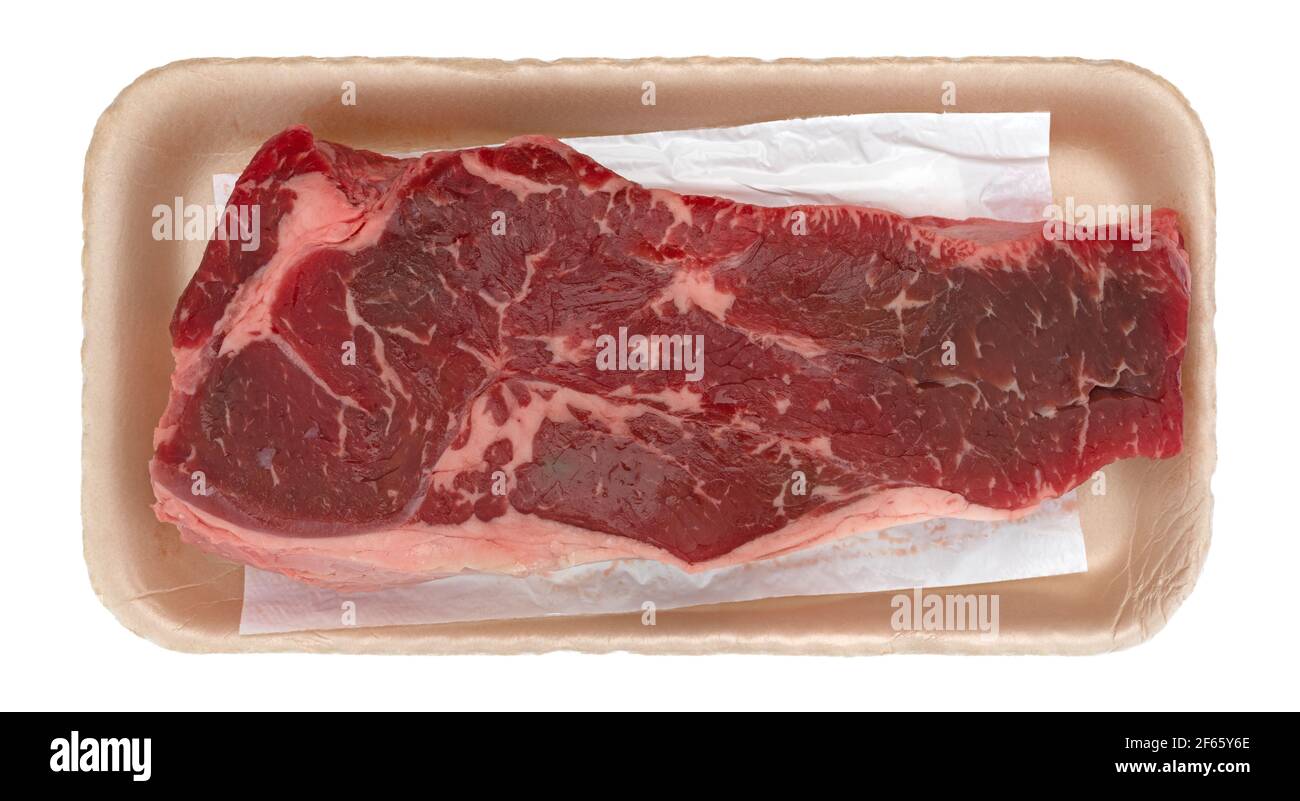 Beef loin boneless end cut strip steak on a foam tray top view. Stock Photo