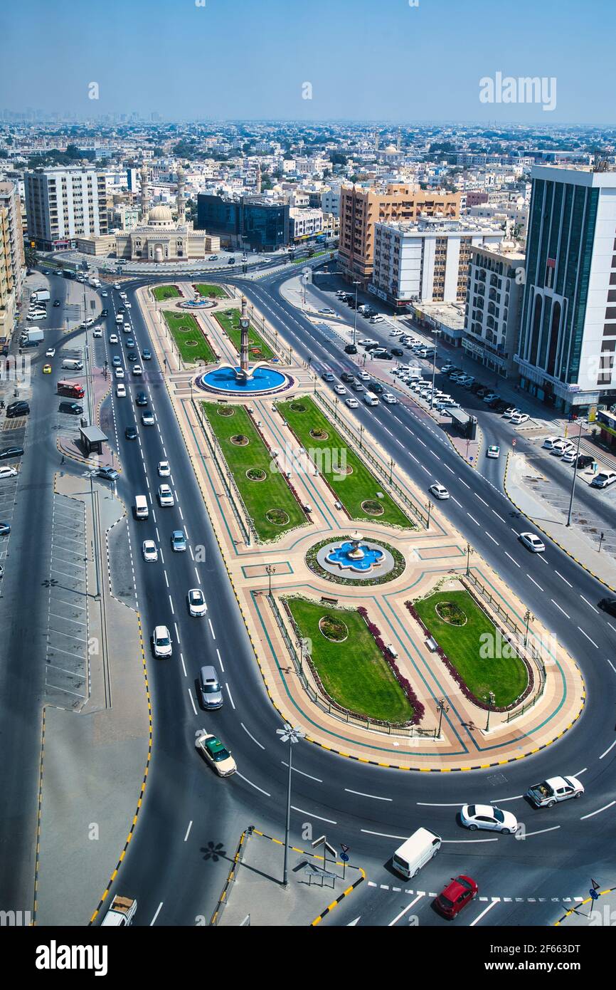 Zahra tower and Sharjah Clock Tower with mosque in Sharjah emirate ...