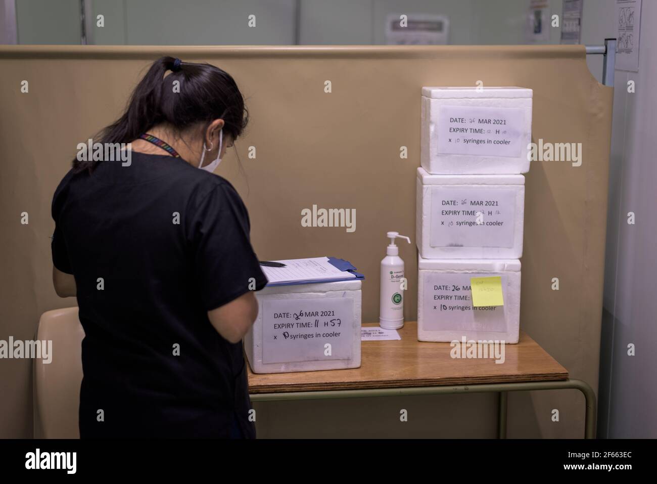A doctor processes the Johnson & Johnson COVID-19 vaccines at Cape Town's Groote Schuur hospital being given to South African health care workers Stock Photo