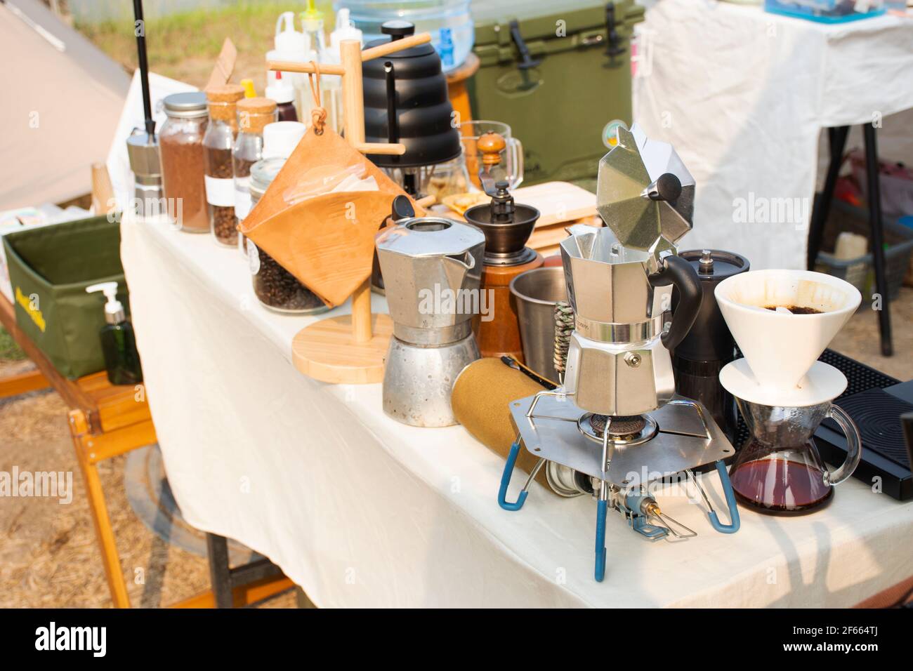 https://c8.alamy.com/comp/2F664TJ/tools-equipment-and-material-for-thai-men-barista-people-use-drip-coffee-maker-or-dripper-made-hot-and-iced-coffee-and-tea-for-sale-at-outdoor-of-cafe-2F664TJ.jpg