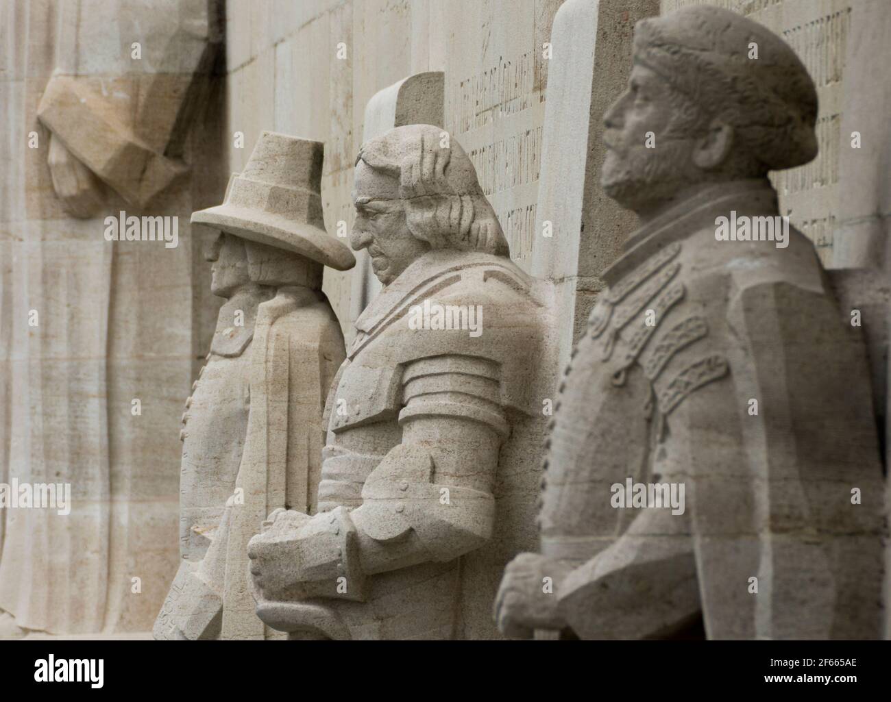 Statues of Roger Williams, Oliver Cromwell and Stephen Bocskai  on the Reformation Wall, Parc des Bastions, Geneva, Switzerland Stock Photo