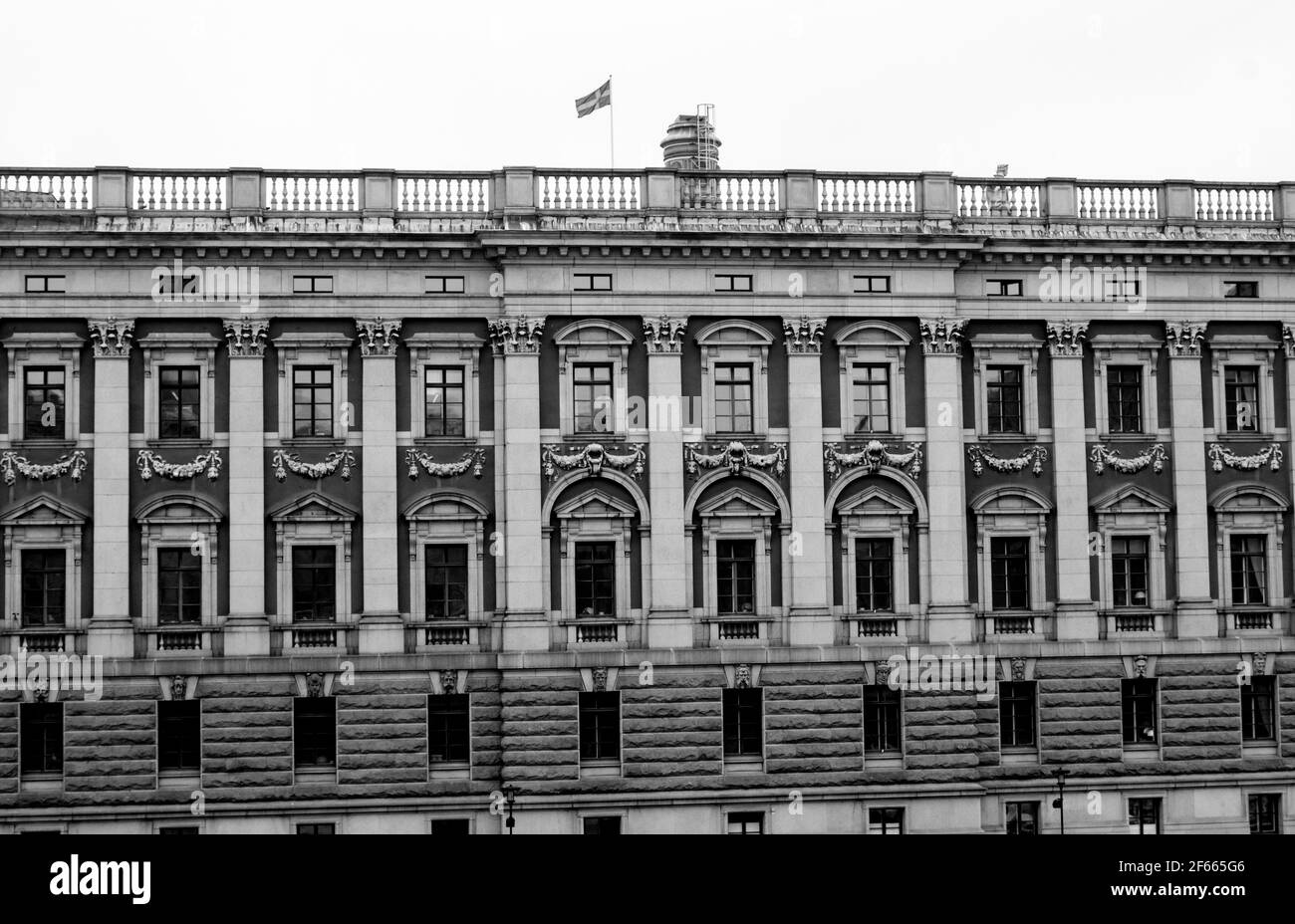 The facade of the Royal Palace (Kungliga slottet) / Stockholm Palace (Stockholms slott), Stockholm, Sweden. B&W Stock Photo