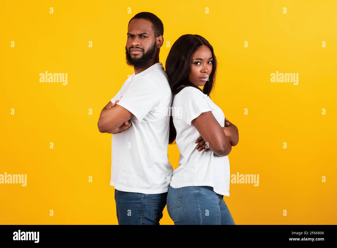 Two angry people back to back hi-res stock photography and images - Alamy