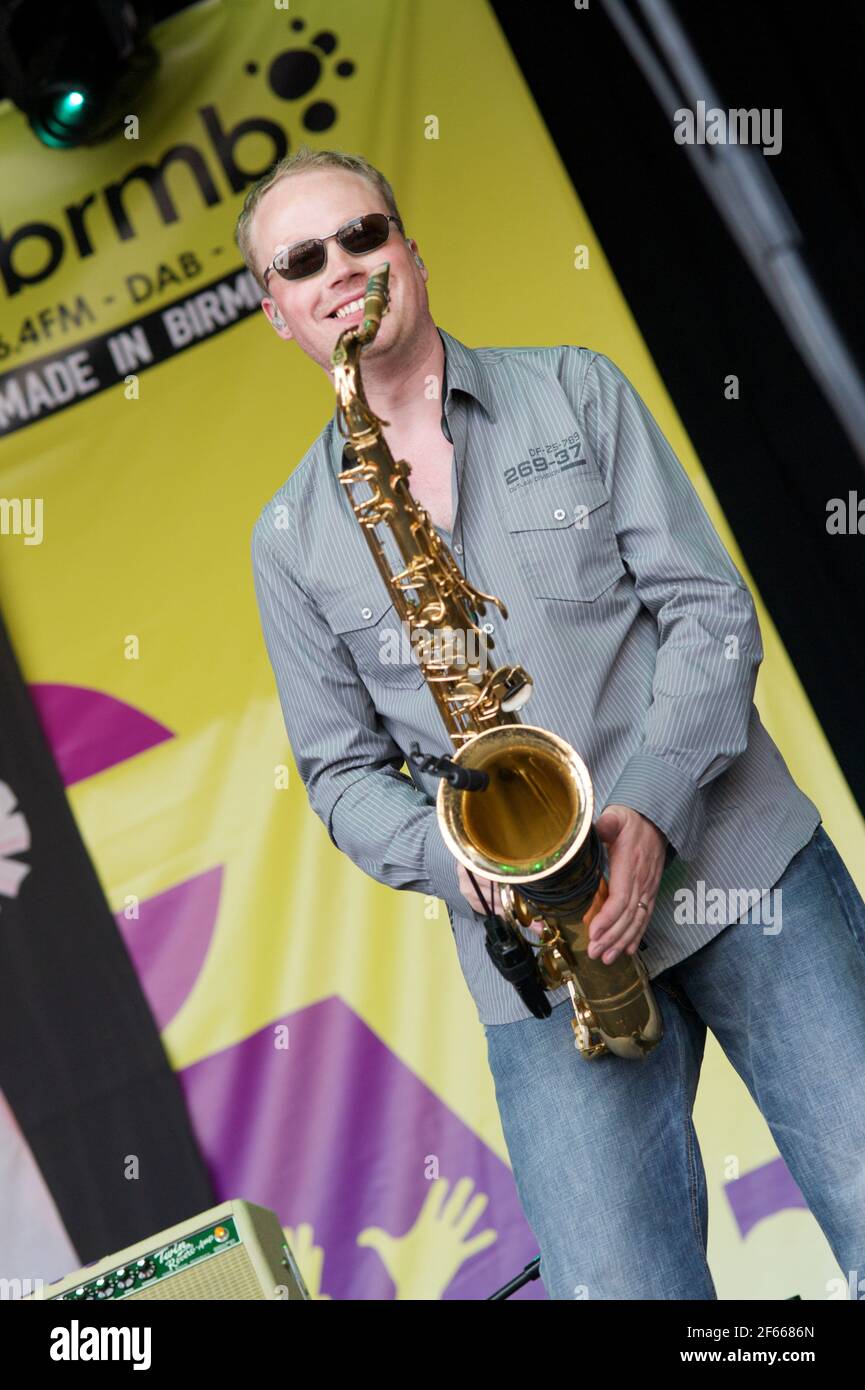 Sean Freeman on saxophone with Level 42 playing live on stage at the Midlands Festival Music 2010 Stock Photo