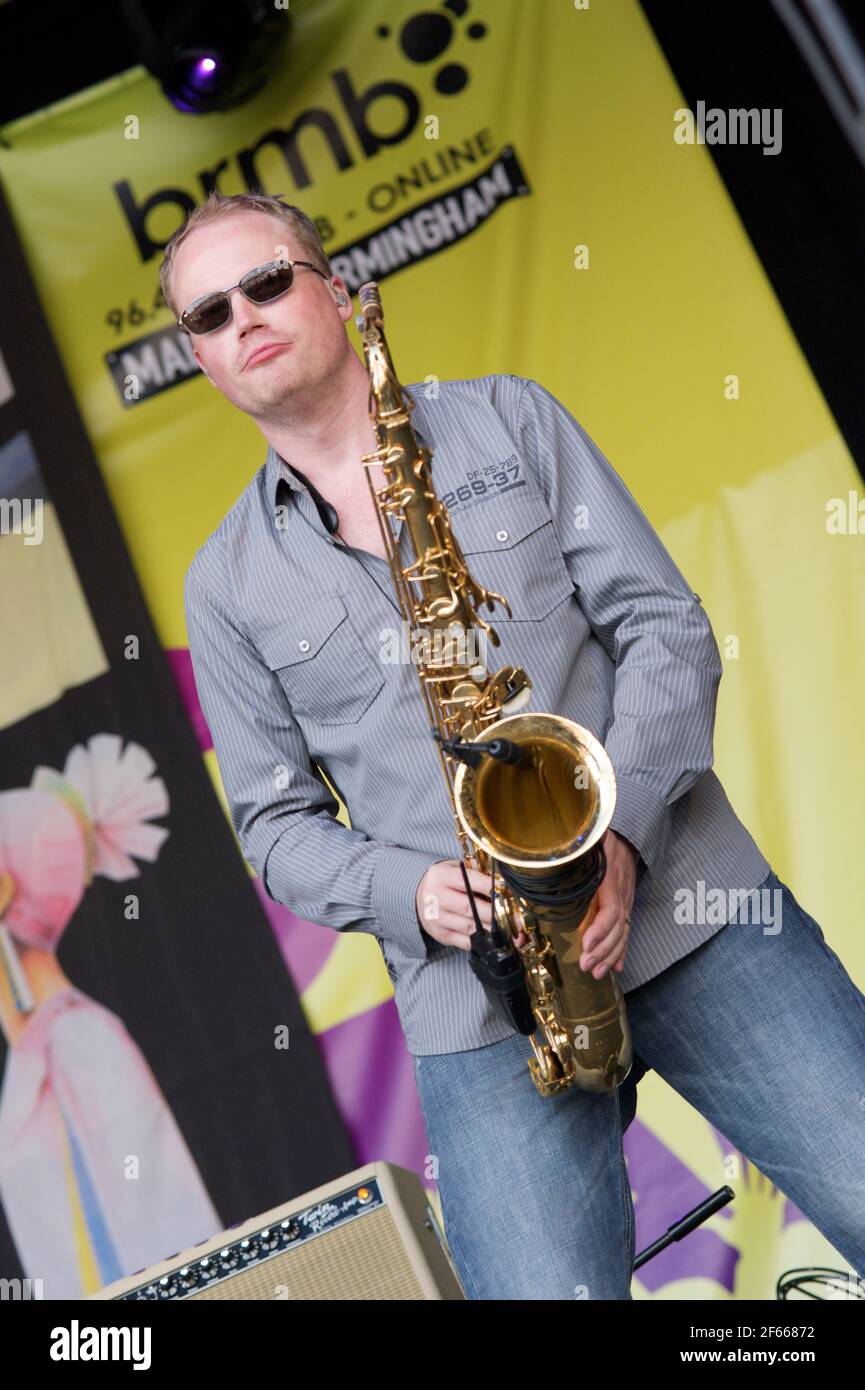 Sean Freeman on saxophone with Level 42 playing live on stage at the Midlands Festival Music 2010 Stock Photo
