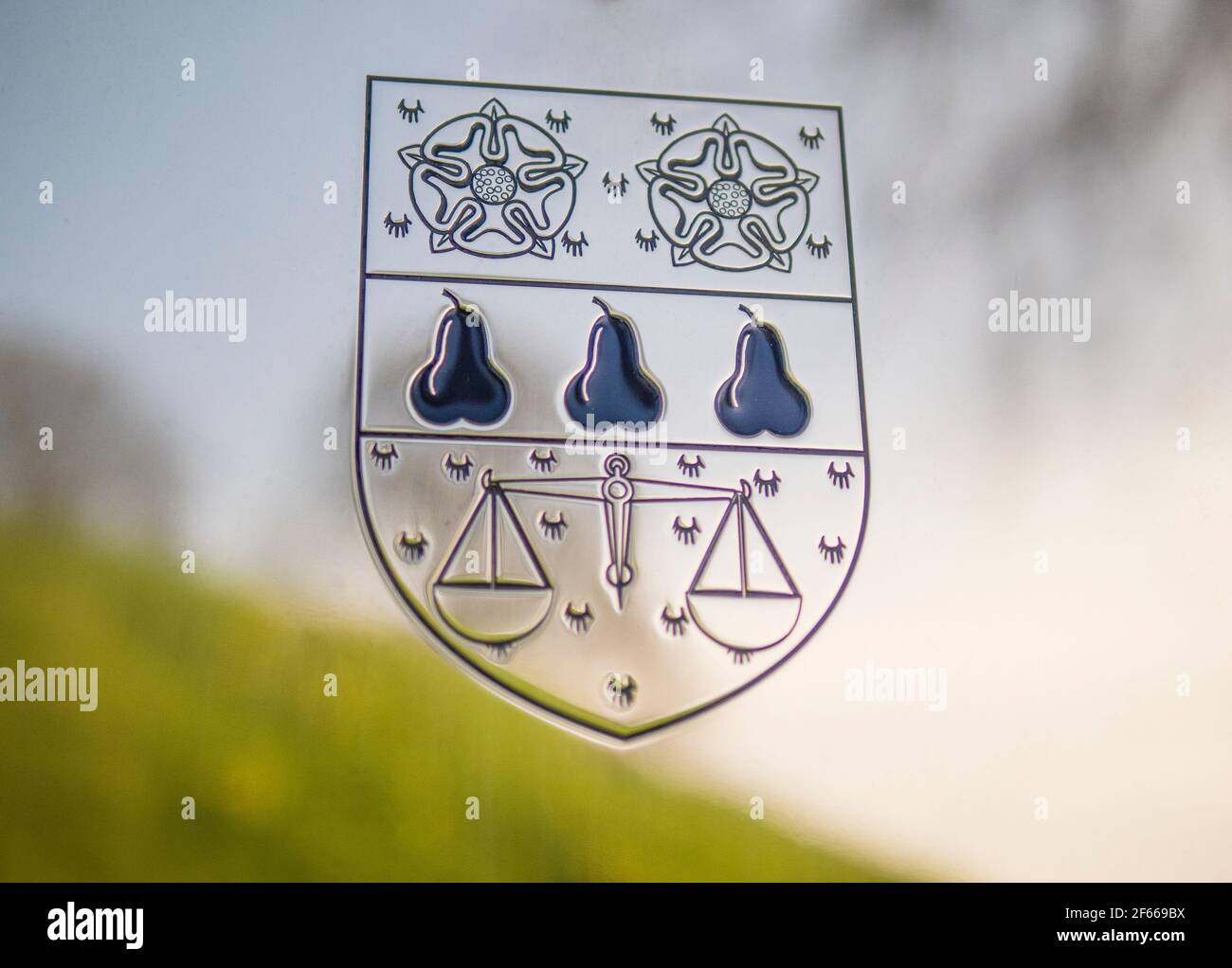 Reflection of Castle Mound, in Nuffield Collage Name Plaque, Oxford University, Oxford, Oxfordshire, England, UK, GB. Stock Photo