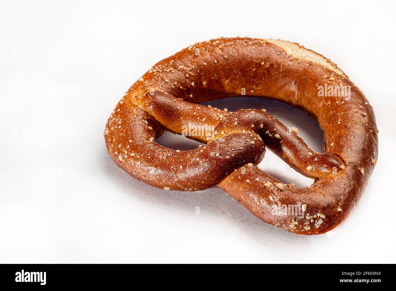 Baking pretzels on a white background. Isolate. White background. Stock Photo