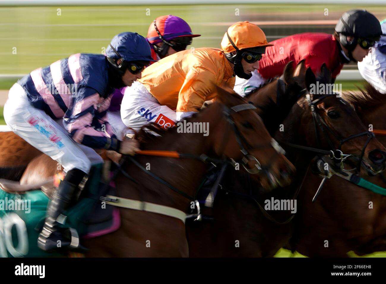 Runners and riders compete in the Happy 21st Birthday Tia Harrison Handicap Hurdle at Warwick Racecourse. Picture date: Tuesday March 30, 2021. Stock Photo