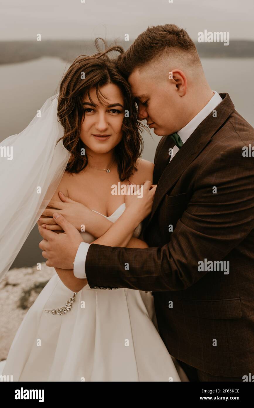 Newlyweds on background sea hi-res stock photography and images - Alamy