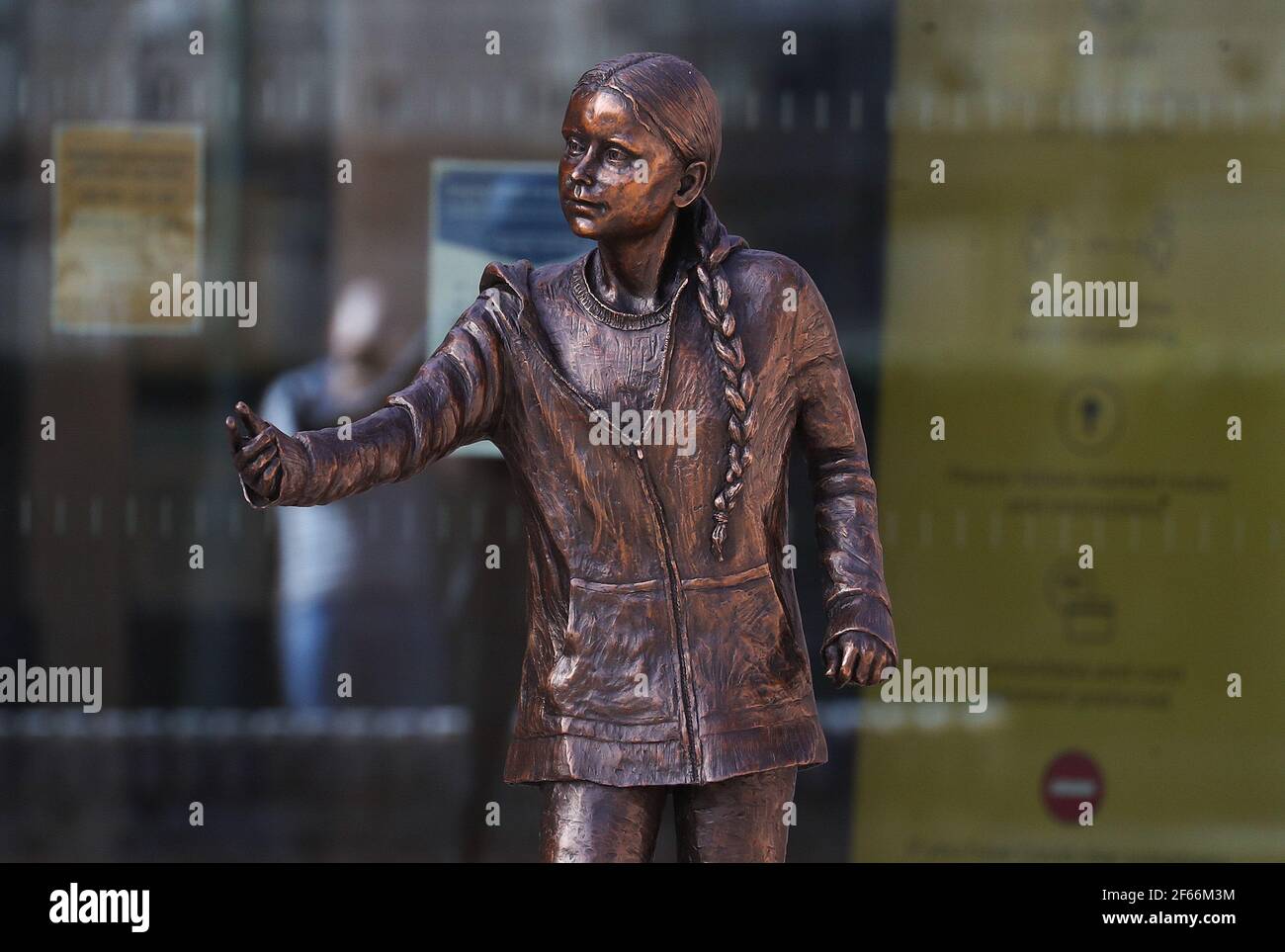 The statue of climate change activist Greta Thunberg which has been installed outside the University of Winchester's West Down Centre in Winchester, Hampshire. Picture date: Tuesday March 30, 2021. Stock Photo
