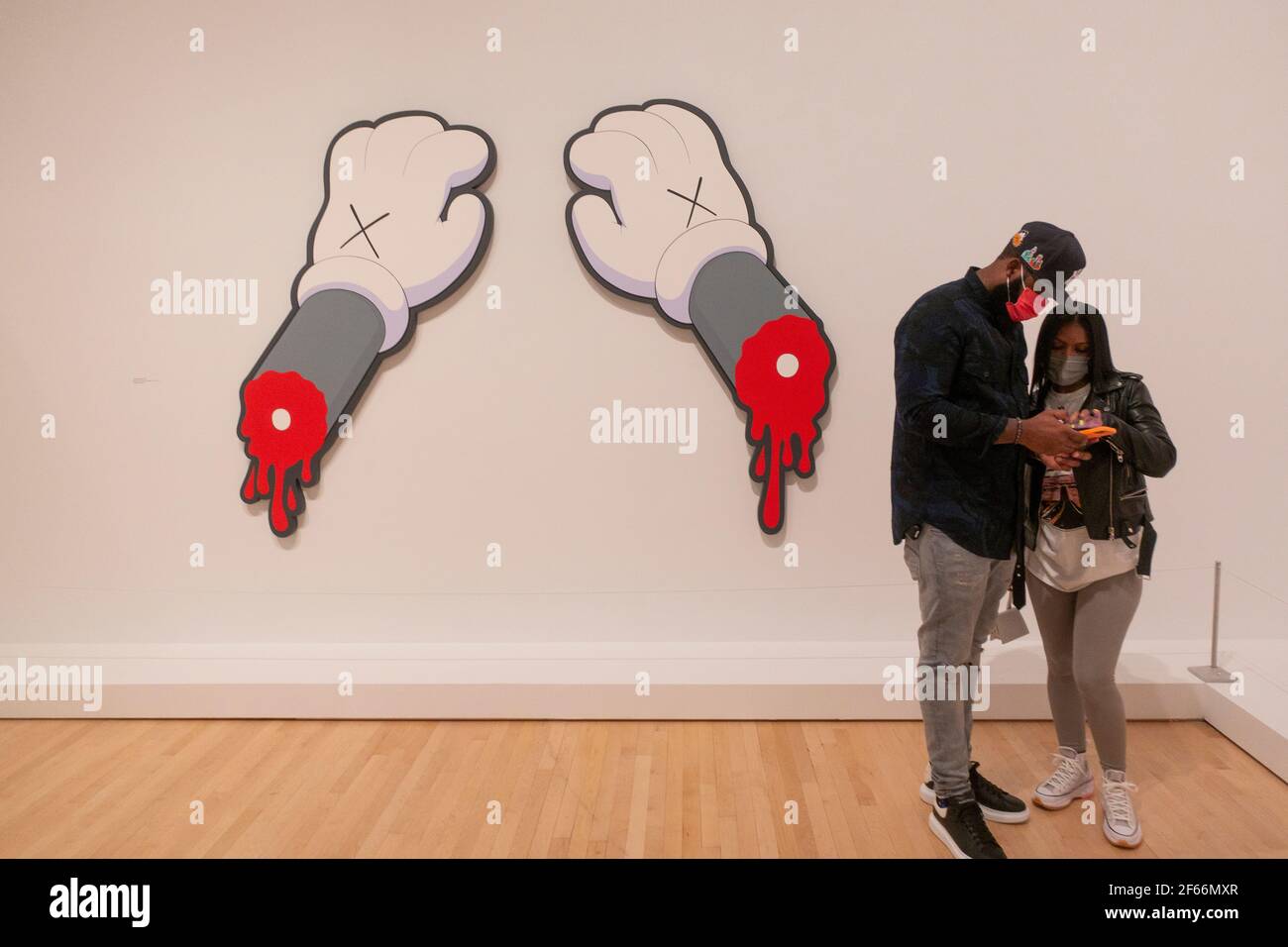 KAWS What party show at Brooklyn Museum of Art in Brooklyn NYC Stock