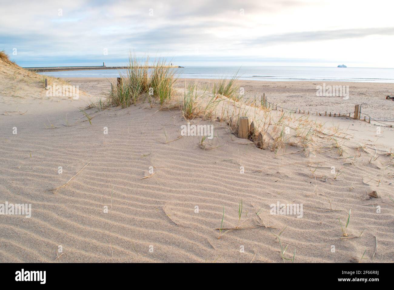 The sandy coastline at South Shields beach, a seaside town near Newcastle upon Tyne in the North East of England. Stock Photo