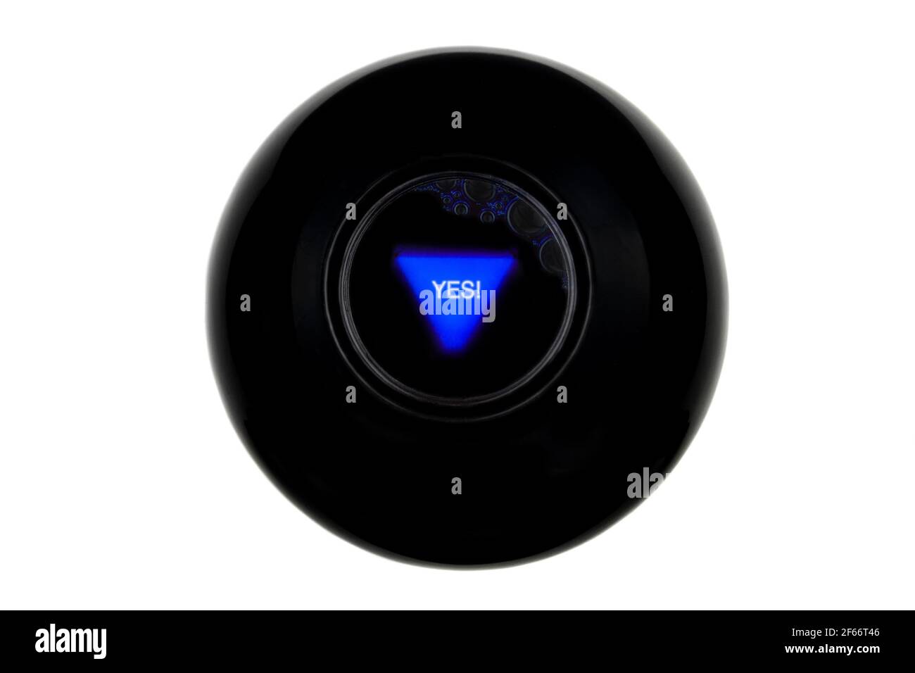 Magic 8 ball with prediction YES isolated on white background Stock Photo