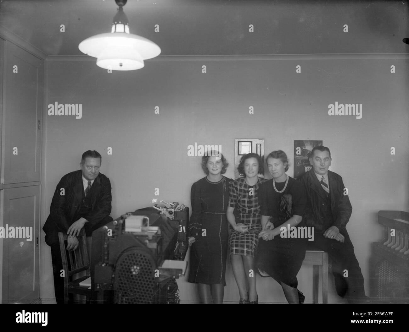 Group staff workers employee employees Black and White Stock Photos ...