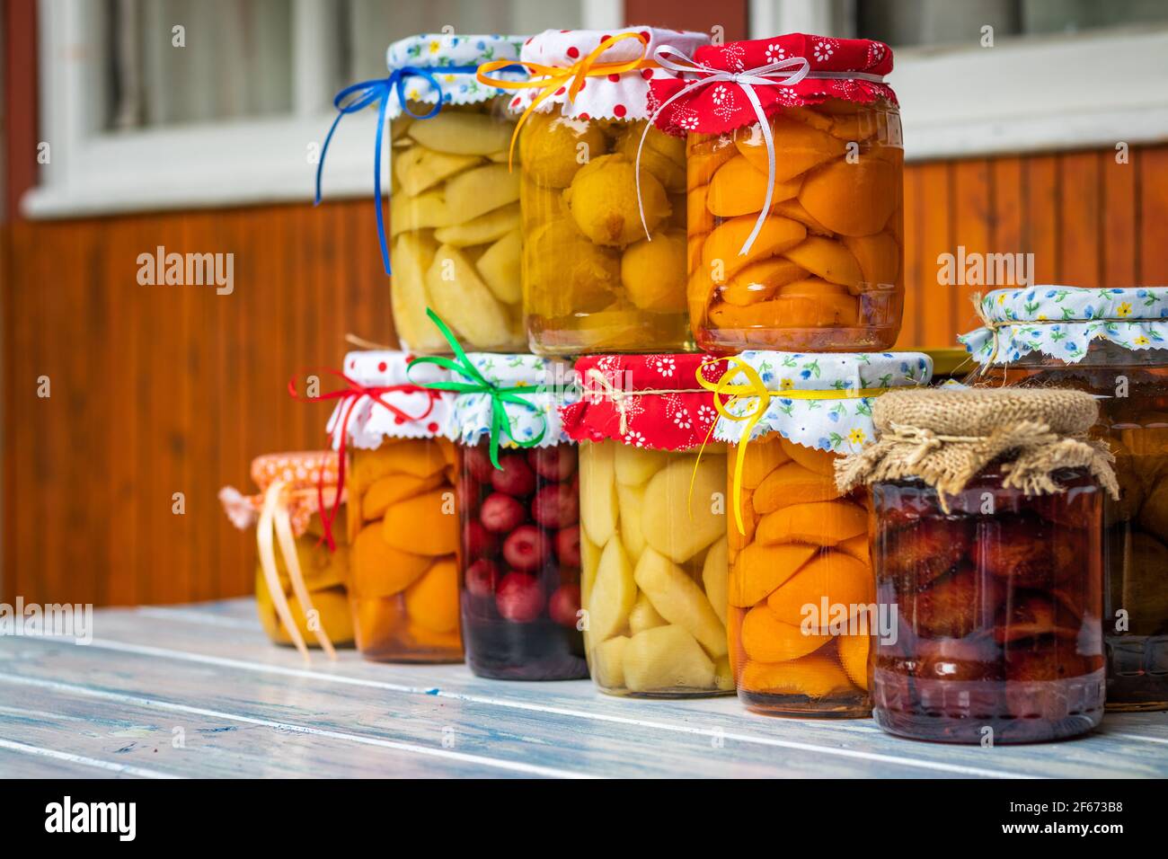 Preserved food in jar, homemade fruit compote. Food concept with