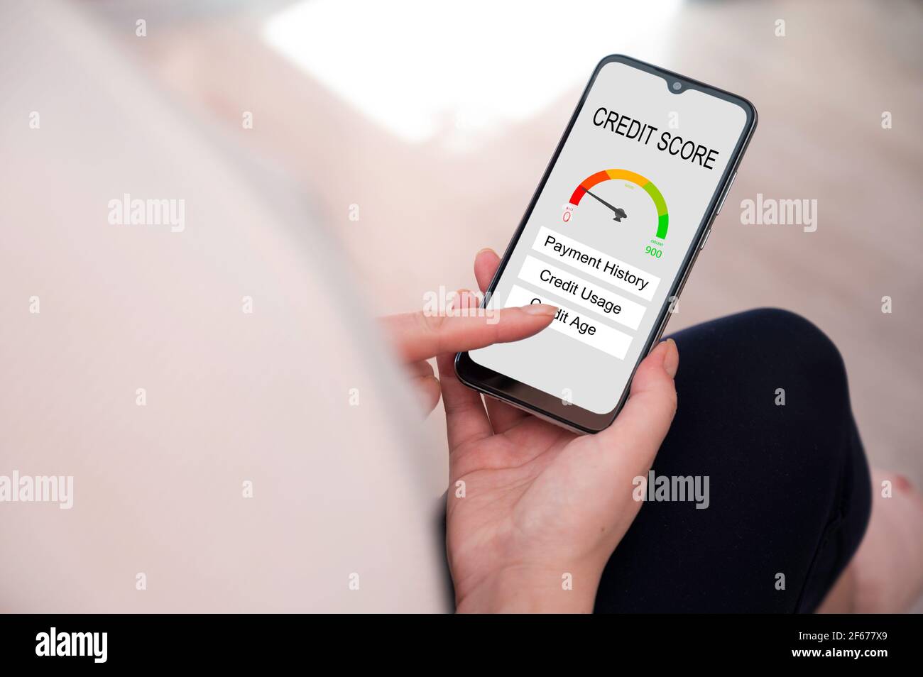 Credit score concept on the screen of smart phone, checking payment history. Online banking concept. Stock Photo