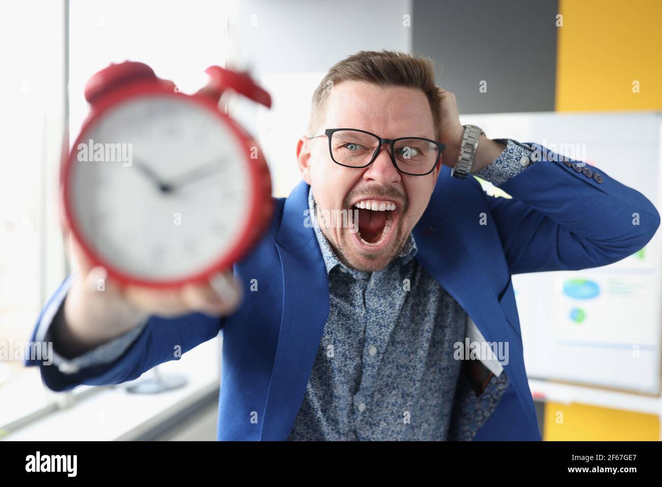 Angry man alarm clock in hires stock photography and images Alamy