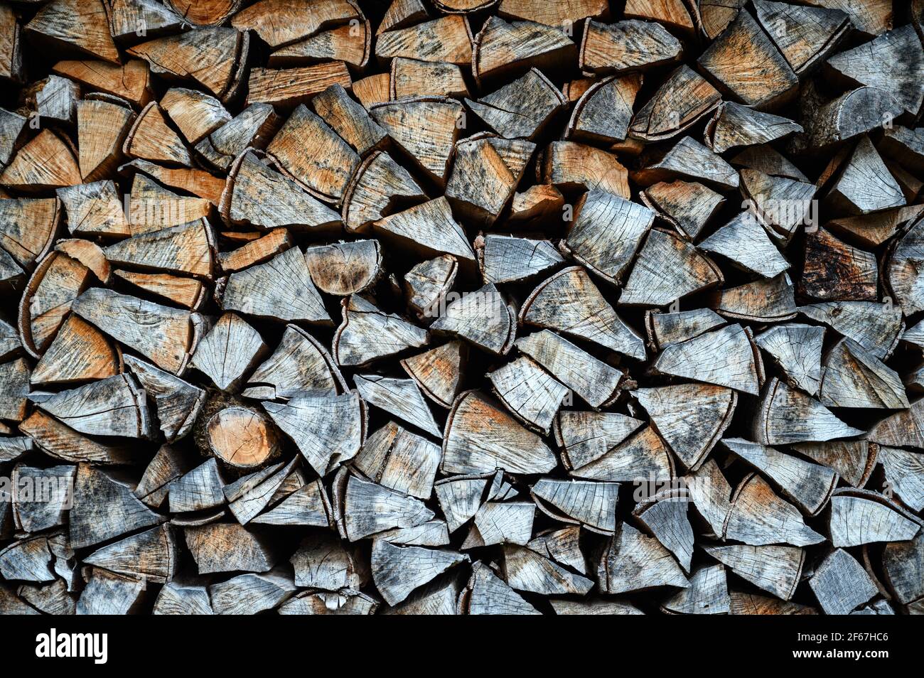 Full frame view of stacked chopped firewood. Natural background ...