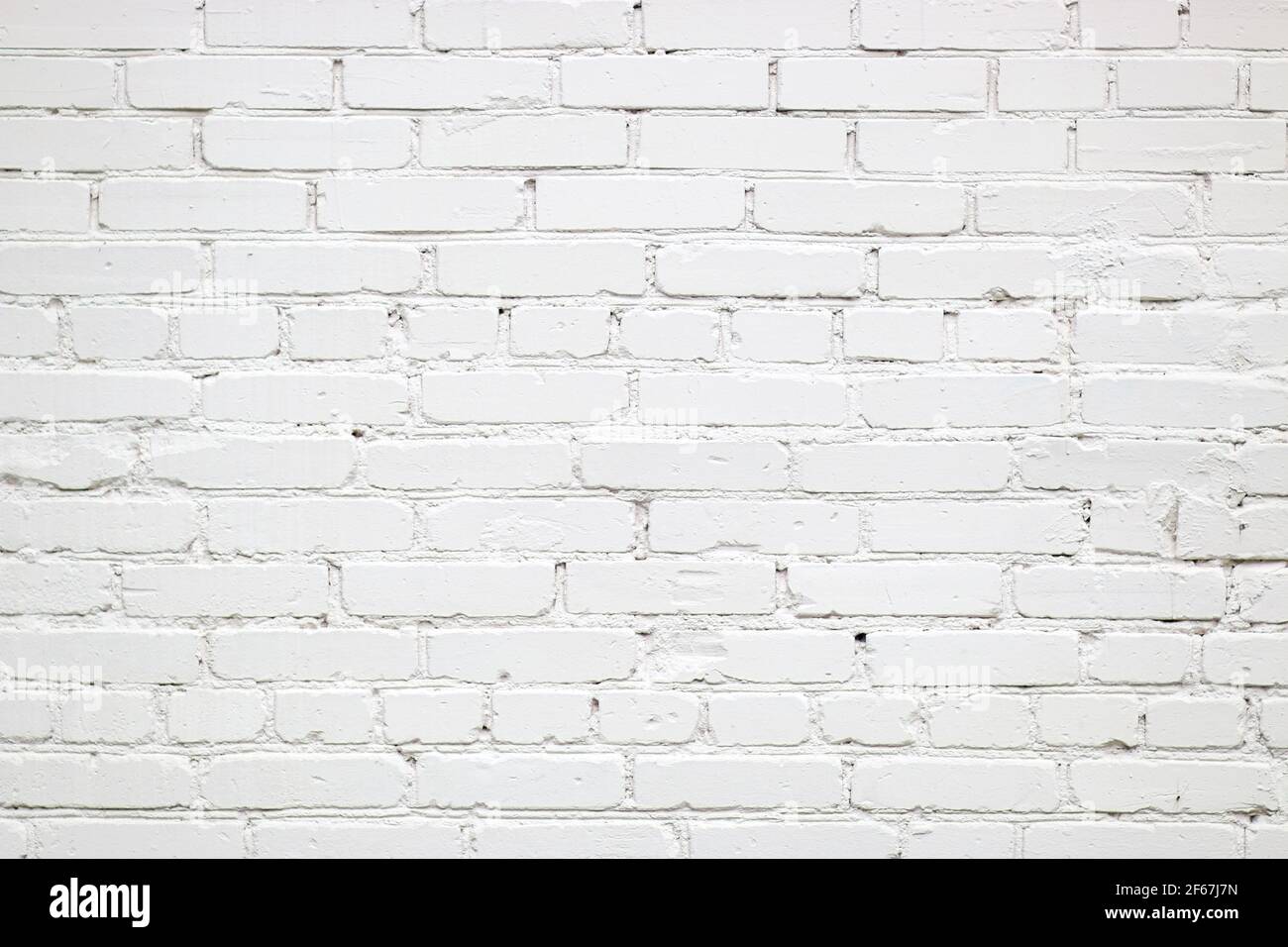Texture of white wall made of old bricks. Surface background with copy space, place for text