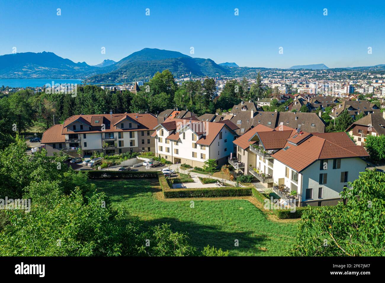 Panoramic view on houses with town in background. Aerial view of