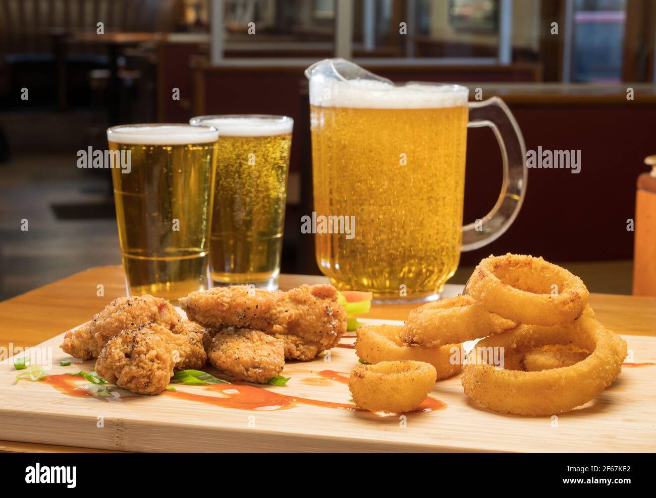 Chicken wings and beer hires stock photography and images Alamy