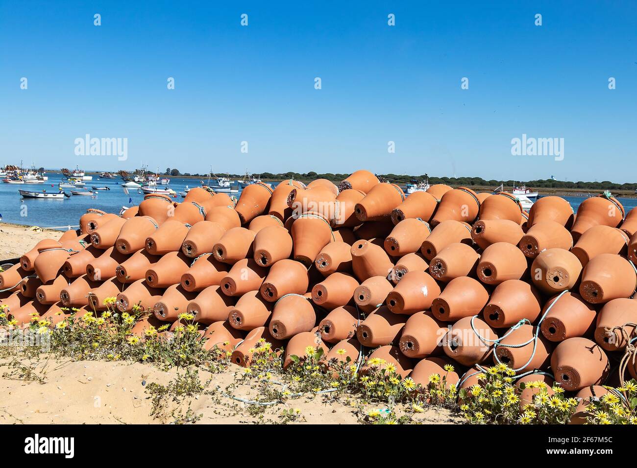 Traditional ceramic pots for catching octopus in Punta Umbria harbor, Huelva, Andalusia, Spain Stock Photo
