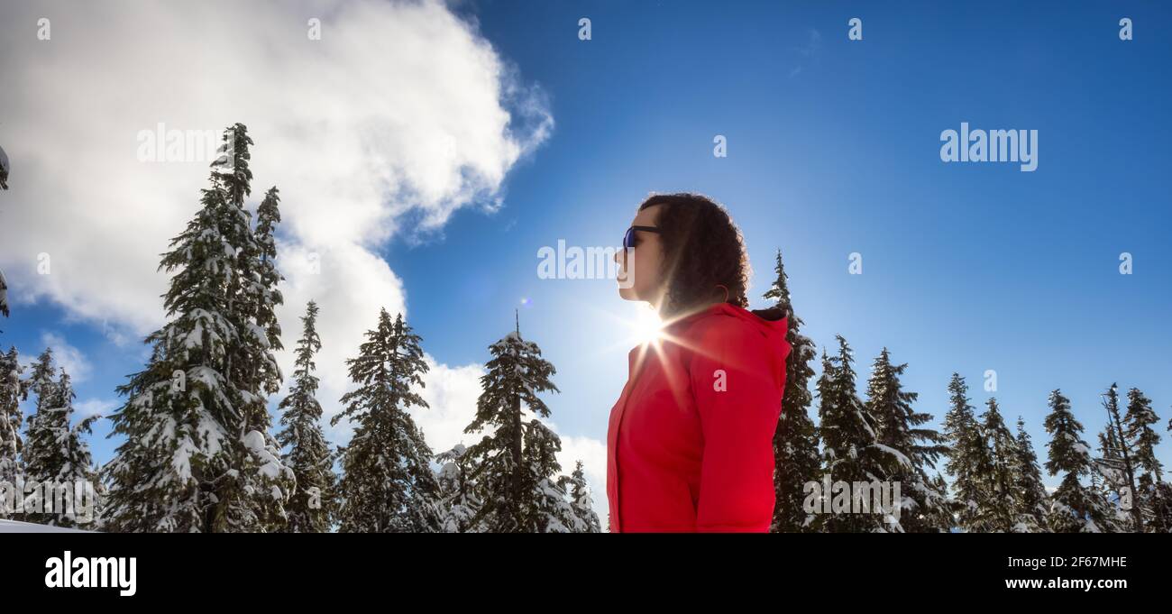 Adventure Woman Hiking on top of Canadian Mountains Stock Photo