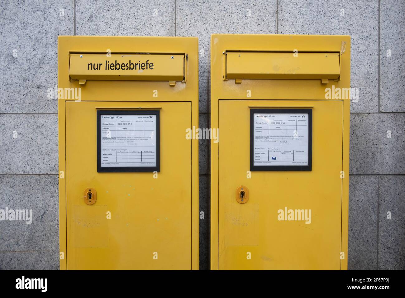 Letterboxes in Cologne city centre, one is labelled 'Love letters only'. Stock Photo