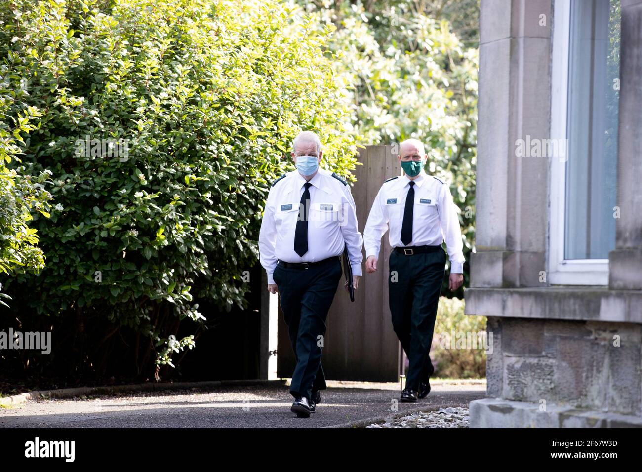 RETRANSMITTING AMENDING THE NAME BRYNE TO BYRNE. PSNI Chief Constable Simon Byrne (left) and Assistant Chief Constable Alan Todd before a press conference to give reaction to the findings of the Public Prosecution Service (PPS) has not recommended prosecution for anyone concerned in relation to the funeral of prominent Irish Republican Bobby Storey in west Belfast on 30 June 2020. The funeral attracted 2,000 mourners at a time when only 30 people were permitted at public gatherings. Stock Photo