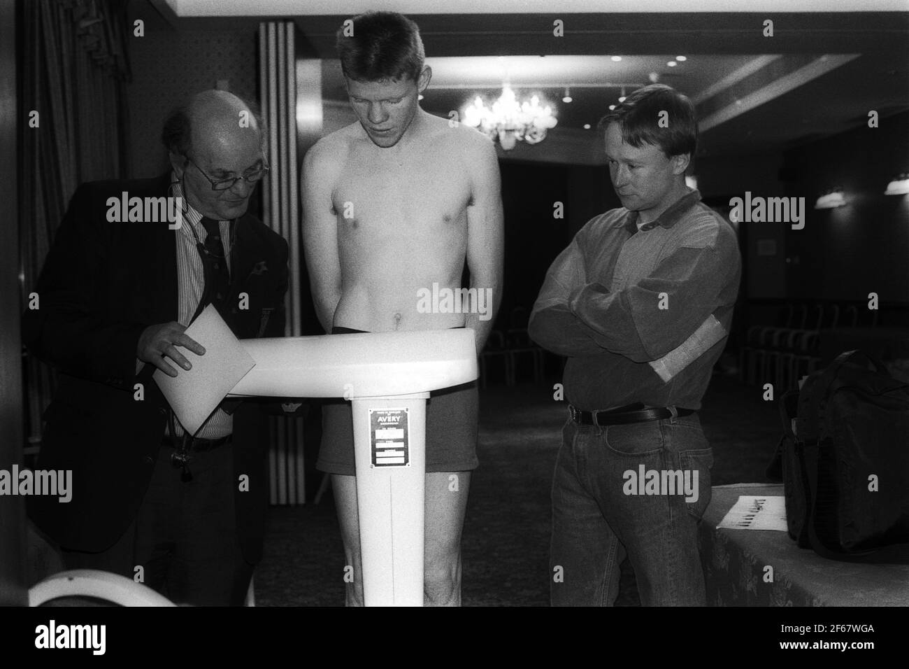 Weighed In Officials in boxing Black and White Stock Photos & Images - Alamy