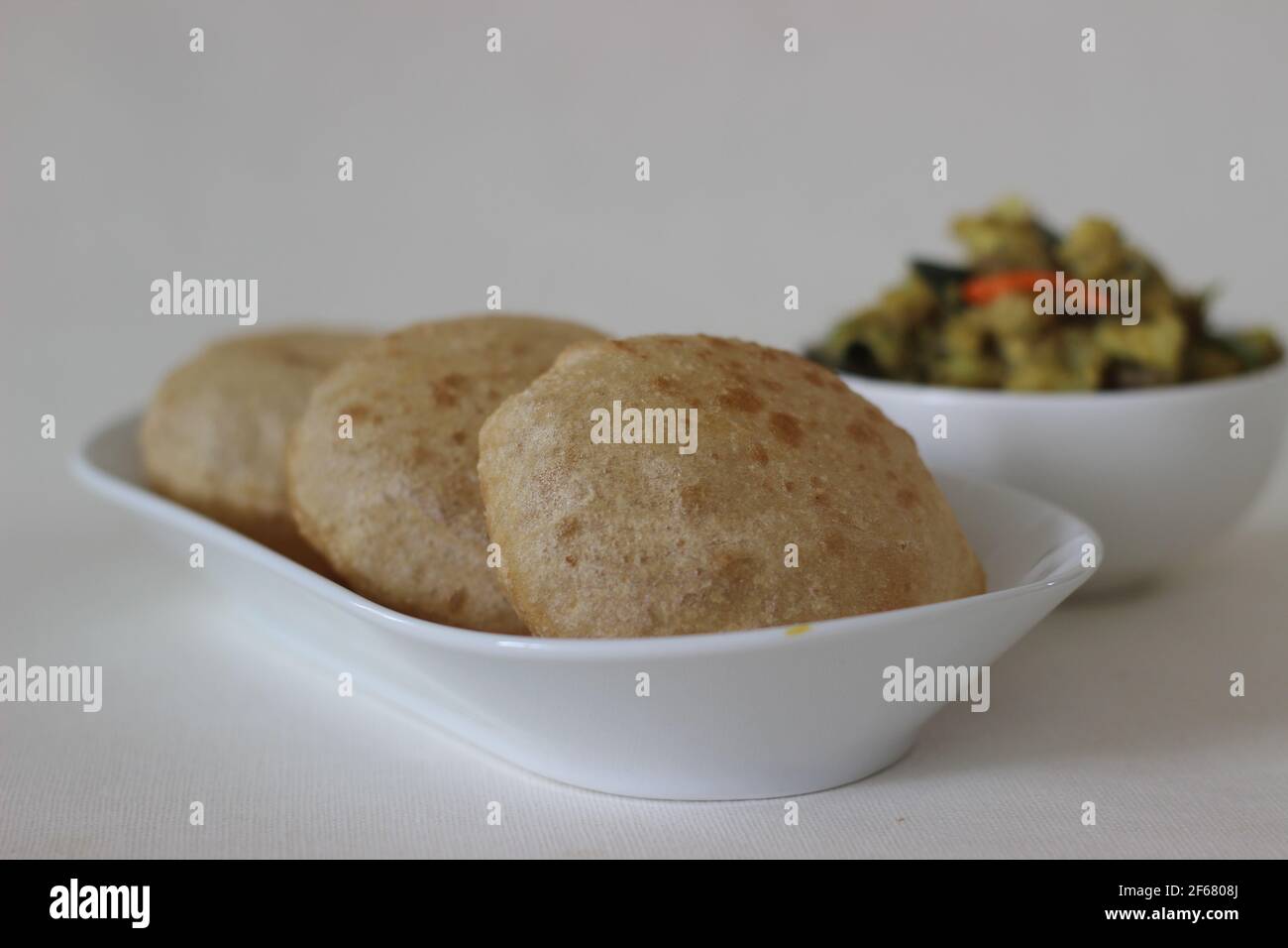 Puri and Potato masala curry. Its a deep fat fried bread made from