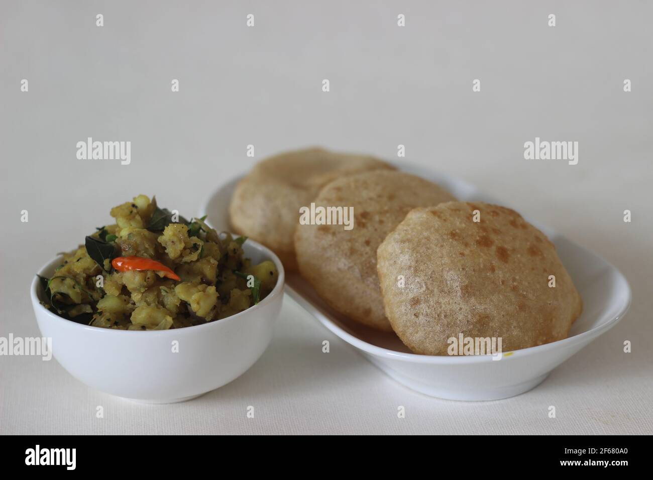 Puri and Potato masala curry. Its a deep fat fried bread made from