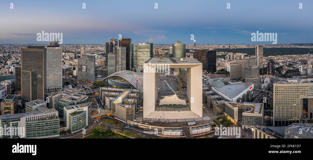 Paris, France - Jun 18, 2020: Aerial drone shot of Skyscrapers in La Defense post pandemic lockdown in sunset Stock Photo