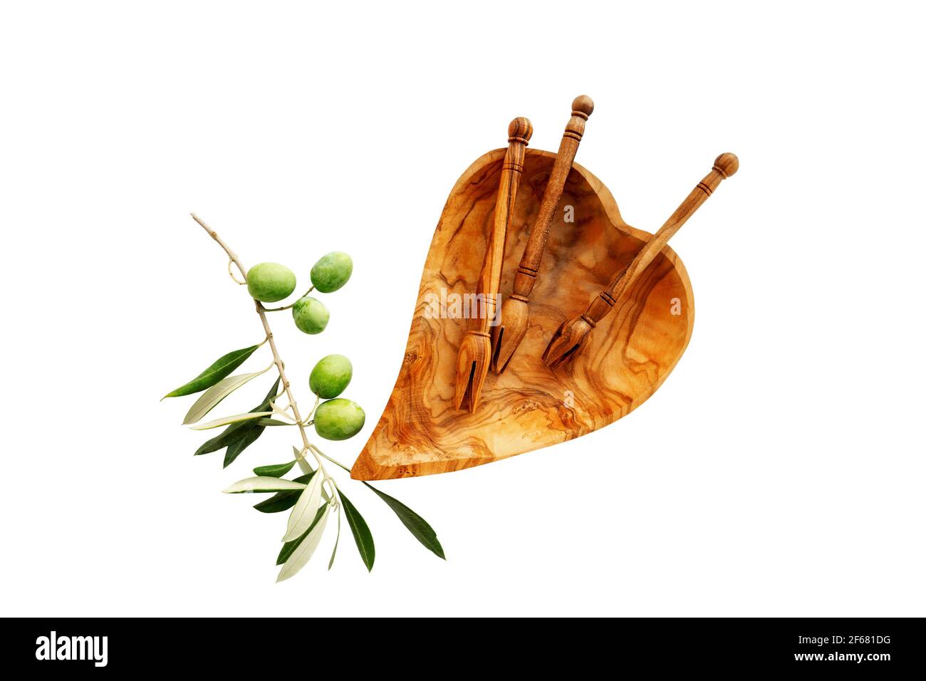 dishes made of olive wood. Eco-friendly choice and friendly nature. concept of a world without plastic and a clean planet. Wooden dishes and a heart-s Stock Photo