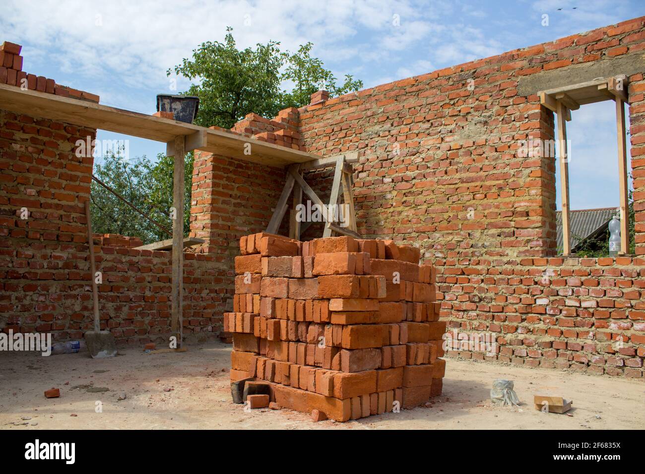 Unfinished house of brick, still under construction,unfinished brick