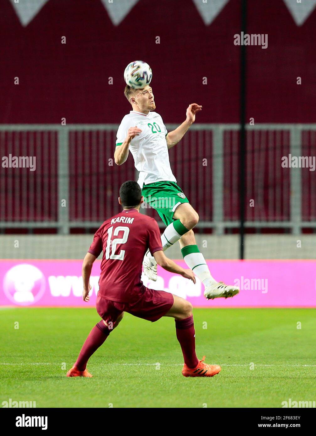Qatar's Karim Boudiaf (left) and Republic of Ireland's Dara O'Shea battle for the ball during the international friendly match at Nagyerdei Stadion, Hungary. Picture date: Tuesday March 30, 2021. Stock Photo