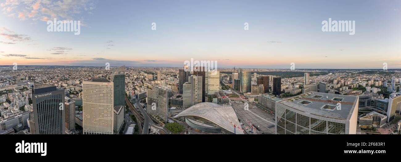 Paris, France - Jun 20, 2020: Panoramic aerial shot of skyscrapers post pandemic lockdown in La Defense in sunset Stock Photo