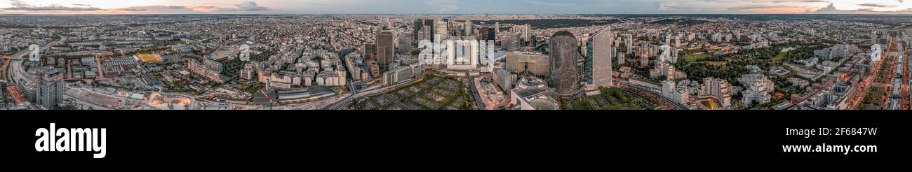 Paris, France - Jun 18, 2020: Panoramic aerial shot of skyscrapers in La Defense post pandemic lockdown at dusk Stock Photo