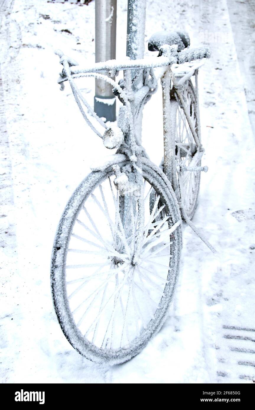 snowed bike in winter Stock Photo